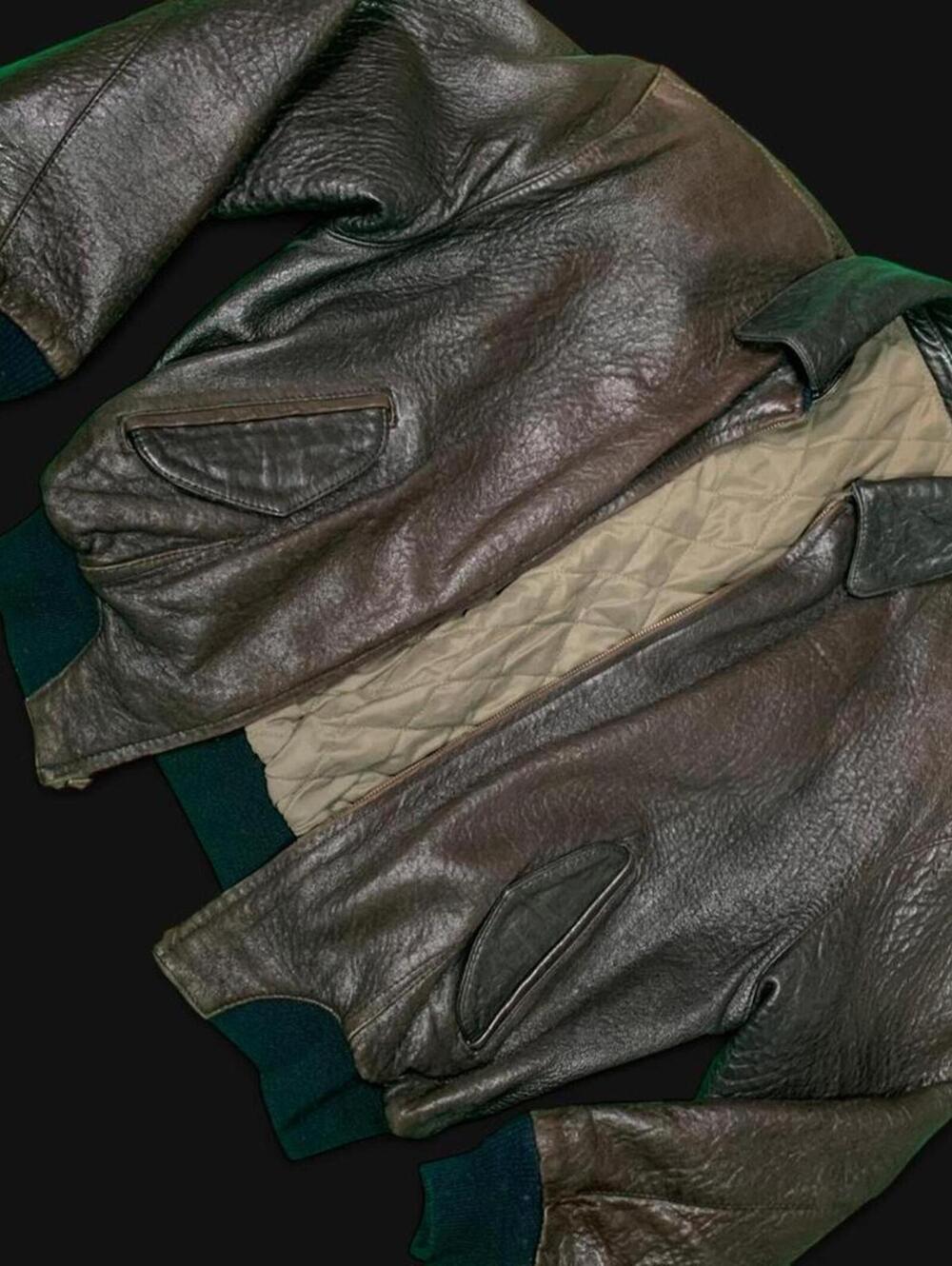 Retro brown leather bomber jacket with quilted lining.